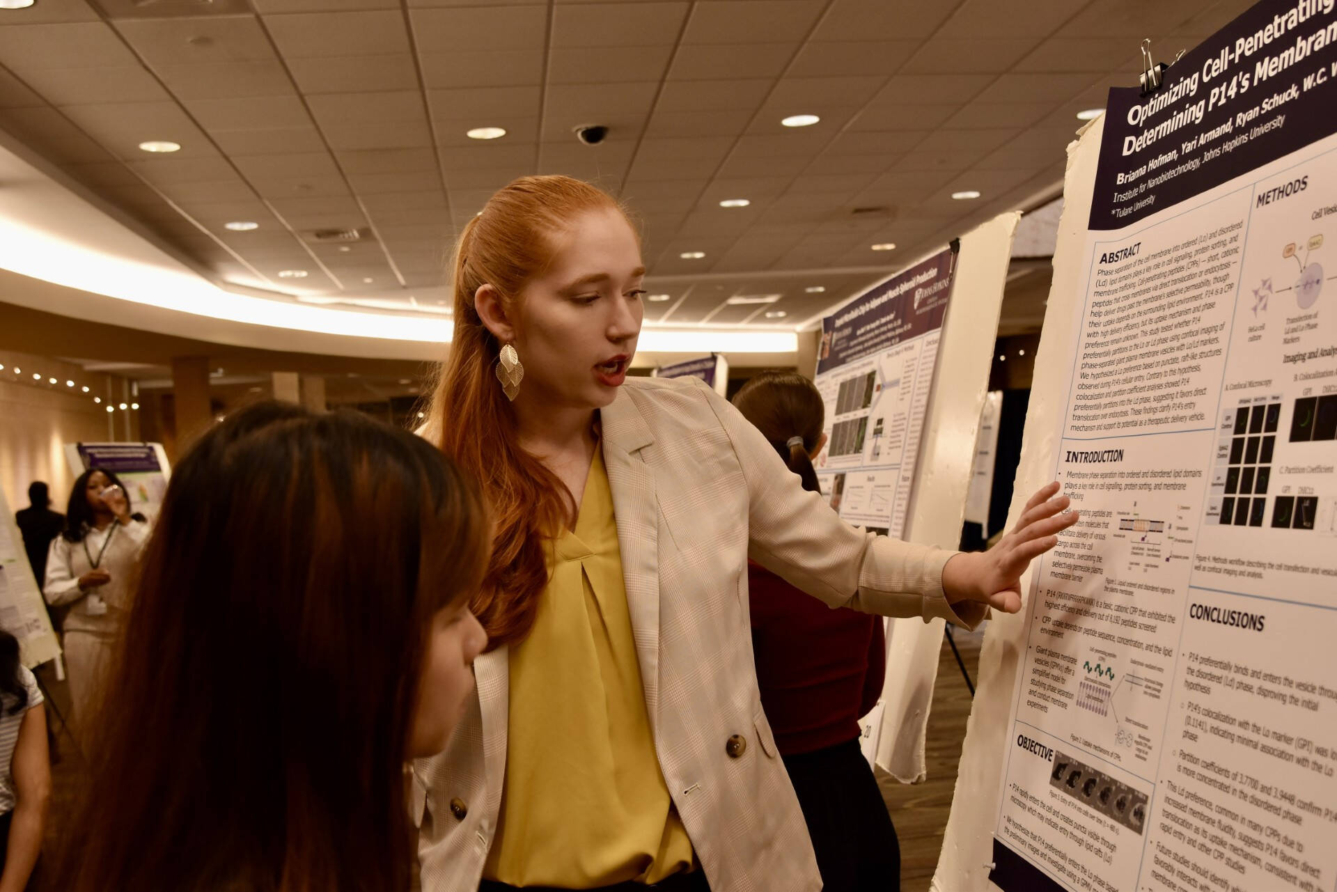 Bri Hofman at conference poster.